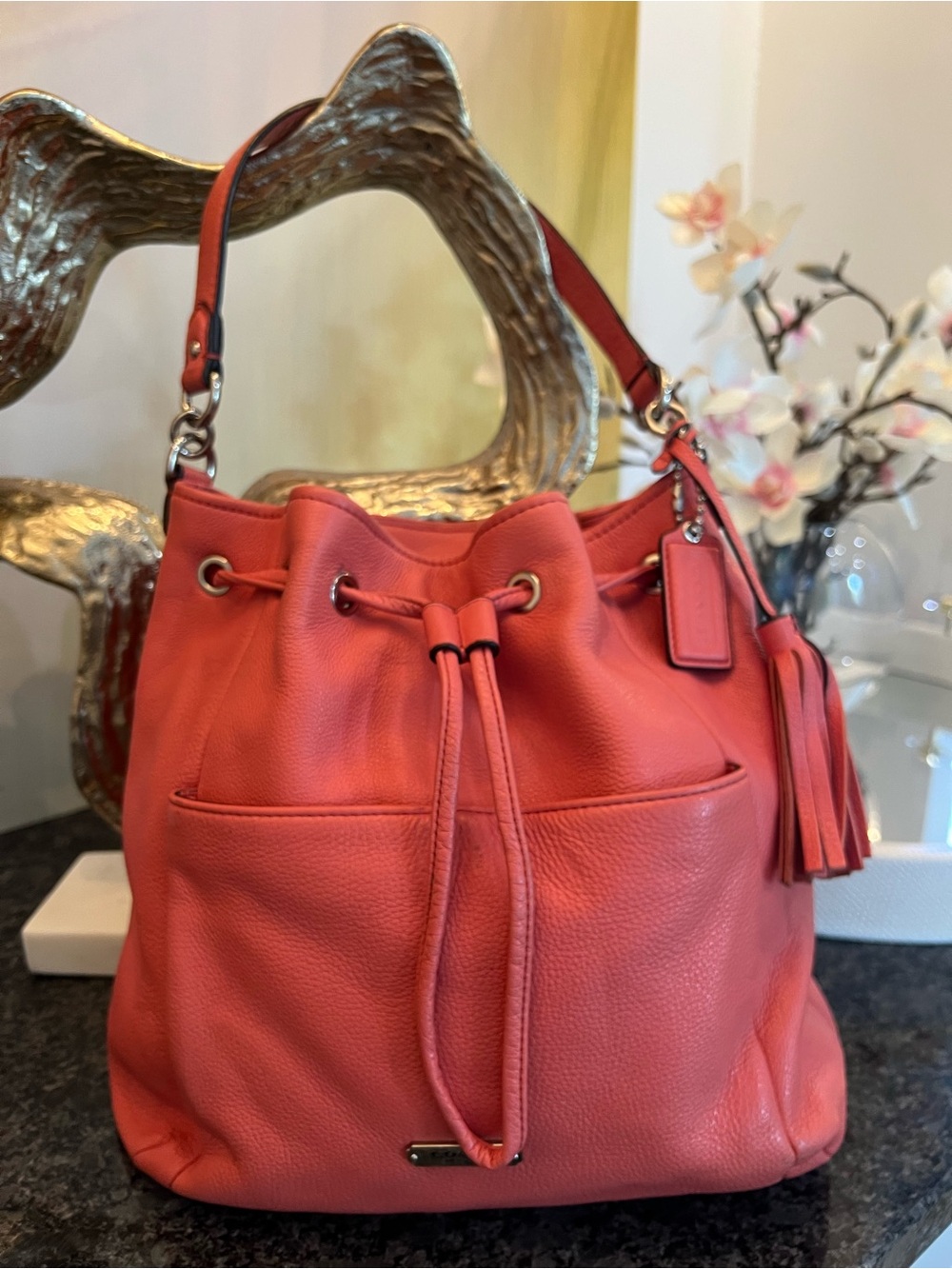 Coach Coral-Red Pebbled Leather Drawstring Shoulder Bag